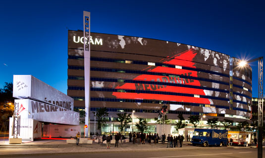 Megaphone converted participants' speech into text, in real time, and projected the words onto the front of the great UQAM Président-Kennedy building. Photo © Moment Factory